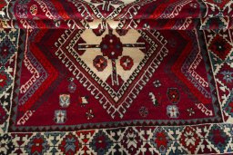 Full view of 1970s Shiraz rug from Iran / Persia, 240 × 133 cm in Red tones