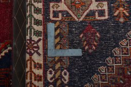 Close-up detail of 2000s Shiraz rug from Iran / Persia showing Wool weave