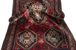 Close-up detail of 2000s Shiraz rug from Iran / Persia showing Wool weave