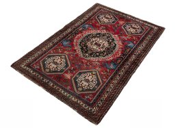 Corner detail of 2000s Shiraz rug showing border pattern and Wool pile