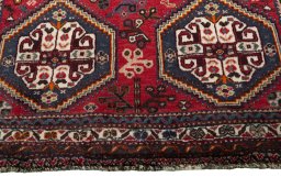 Close-up detail of 2000s Shiraz rug from Iran / Persia showing Wool weave