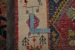 Close-up detail of 2000s Shiraz rug from Iran / Persia showing Wool weave