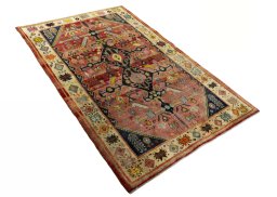 Close-up detail of 2000s Shiraz rug from Iran / Persia showing Wool weave