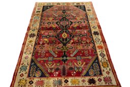 Surface texture of 2000s Shiraz rug with natural Wool and intricate pattern