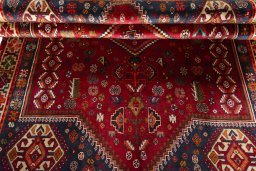 Corner detail of 2000s Shiraz rug showing border pattern and Wool pile