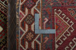 Close-up detail of 2000s Shiraz rug from Iran / Persia showing Wool weave