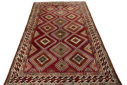 Surface texture of 2000s Shiraz rug with natural Wool and intricate pattern