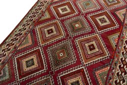 Backside of handmade 2000s Shiraz rug showing knot structure and weave density