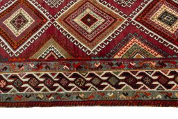 Close-up detail of 2000s Shiraz rug from Iran / Persia showing Wool weave