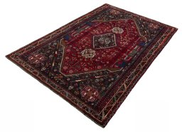 Corner detail of 1970s Shiraz rug showing border pattern and Wool pile