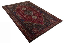Close-up detail of 1970s Shiraz rug from Iran / Persia showing Wool weave