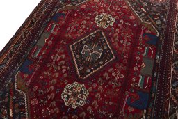 Backside of handmade 1970s Shiraz rug showing knot structure and weave density