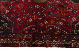 Close-up detail of 2000s Shiraz rug from Iran / Persia showing Wool weave