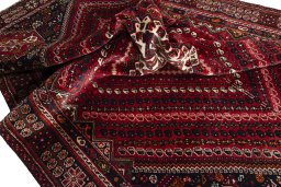 Close-up detail of 2000s Shiraz rug from Iran / Persia showing Wool weave