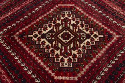 Central medallion detail of 2000s Shiraz rug from Iran / Persia