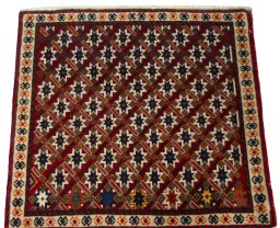 Surface texture of 2000s Shiraz rug with natural Wool and intricate pattern