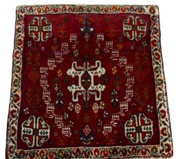 Surface texture of 2000s Shiraz rug with natural Wool and intricate pattern