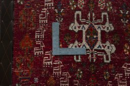 Backside of handmade 2000s Shiraz rug showing knot structure and weave density