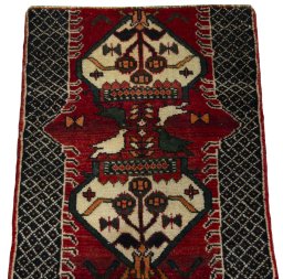 Surface texture of 2000s Shiraz rug with natural Wool and intricate pattern