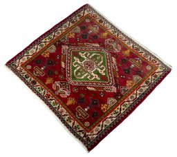 Corner detail of 2000s Shiraz rug showing border pattern and Wool pile