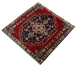 Corner detail of 2000s Shiraz rug showing border pattern and Wool pile