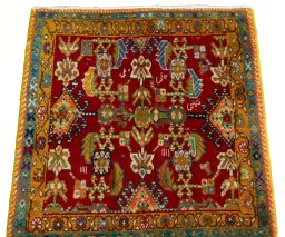 Surface texture of 2000s Shiraz rug with natural Wool and intricate pattern