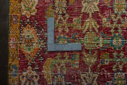 Backside of handmade 2000s Shiraz rug showing knot structure and weave density