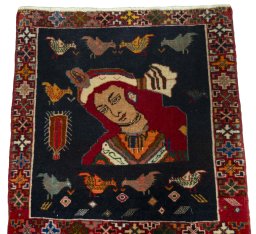 Surface texture of 2000s Shiraz rug with natural Wool and intricate pattern