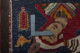 Backside of handmade 2000s Shiraz rug showing knot structure and weave density