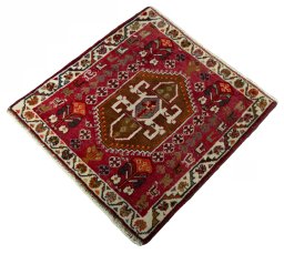 Corner detail of 2000s Shiraz rug showing border pattern and Wool pile