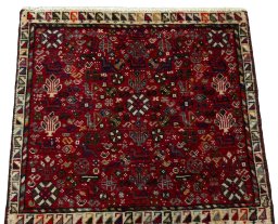 Surface texture of 2000s Shiraz rug with natural Wool and intricate pattern