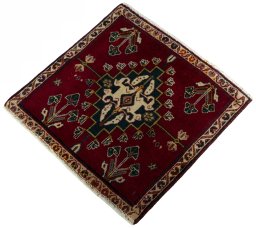 Corner detail of 2000s Shiraz rug showing border pattern and Wool pile