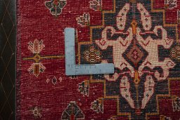 Backside of handmade 2000s Shiraz rug showing knot structure and weave density