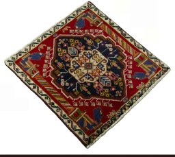 Close-up detail of 2000s Shiraz rug from Iran / Persia showing Wool weave
