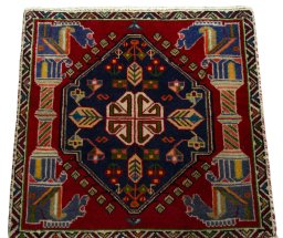Surface texture of 2000s Shiraz rug with natural Wool and intricate pattern