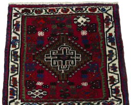 Surface texture of 2000s Shiraz rug with natural Wool and intricate pattern