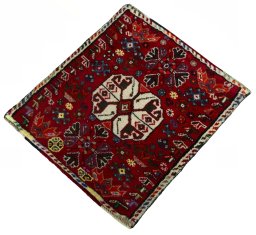 Corner detail of 2000s Shiraz rug showing border pattern and Wool pile