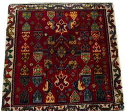 Surface texture of 2000s Shiraz rug with natural Wool and intricate pattern