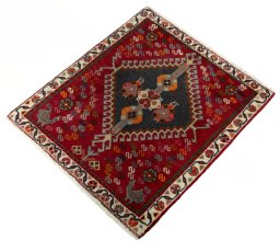 Corner detail of 2000s Shiraz rug showing border pattern and Wool pile