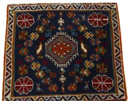 Surface texture of 2000s Shiraz rug with natural Wool and intricate pattern