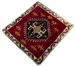 Corner detail of 2000s Shiraz rug showing border pattern and Wool pile