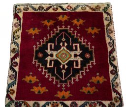 Surface texture of 2000s Shiraz rug with natural Wool and intricate pattern