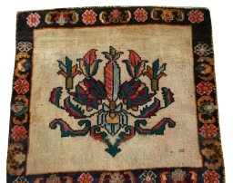 Surface texture of 2000s Shiraz rug with natural Wool and intricate pattern