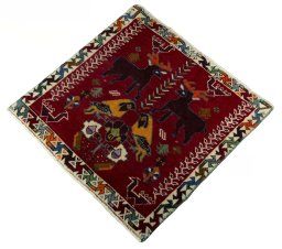Corner detail of 2000s Shiraz rug showing border pattern and Wool pile