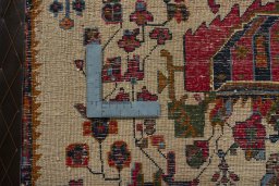 Backside of handmade 2000s Shiraz rug showing knot structure and weave density