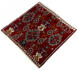Corner detail of 2000s Shiraz rug showing border pattern and Wool pile