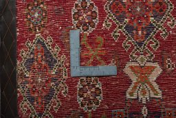 Backside of handmade 2000s Shiraz rug showing knot structure and weave density