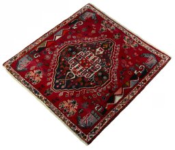 Corner detail of 2000s Shiraz rug showing border pattern and Wool pile