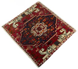 Corner detail of 2000s Shiraz rug showing border pattern and Wool pile