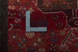 Backside of handmade 2000s Shiraz rug showing knot structure and weave density
